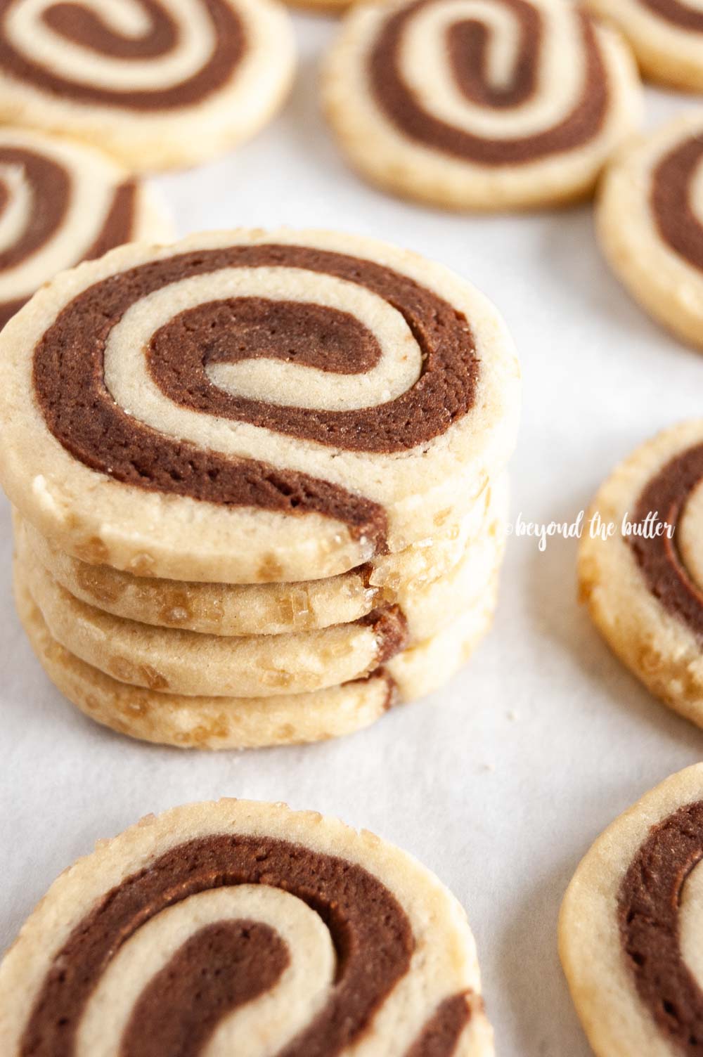 Close up image of small stack of Chocolate Pinwheel Cookies | All images © Beyond the Butter™