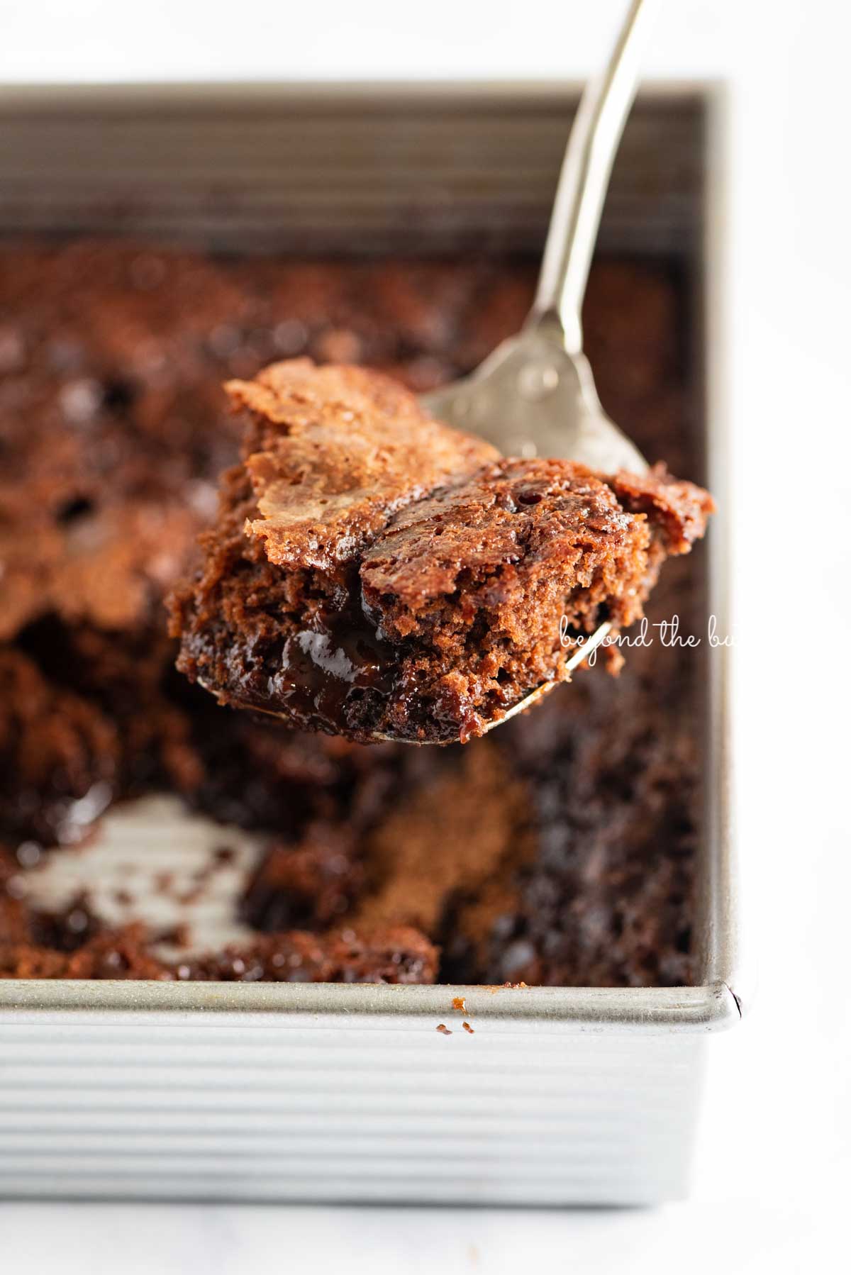 Serving up some hot fudge pudding cake from BeyondtheButter.com | © Beyond the Butter®