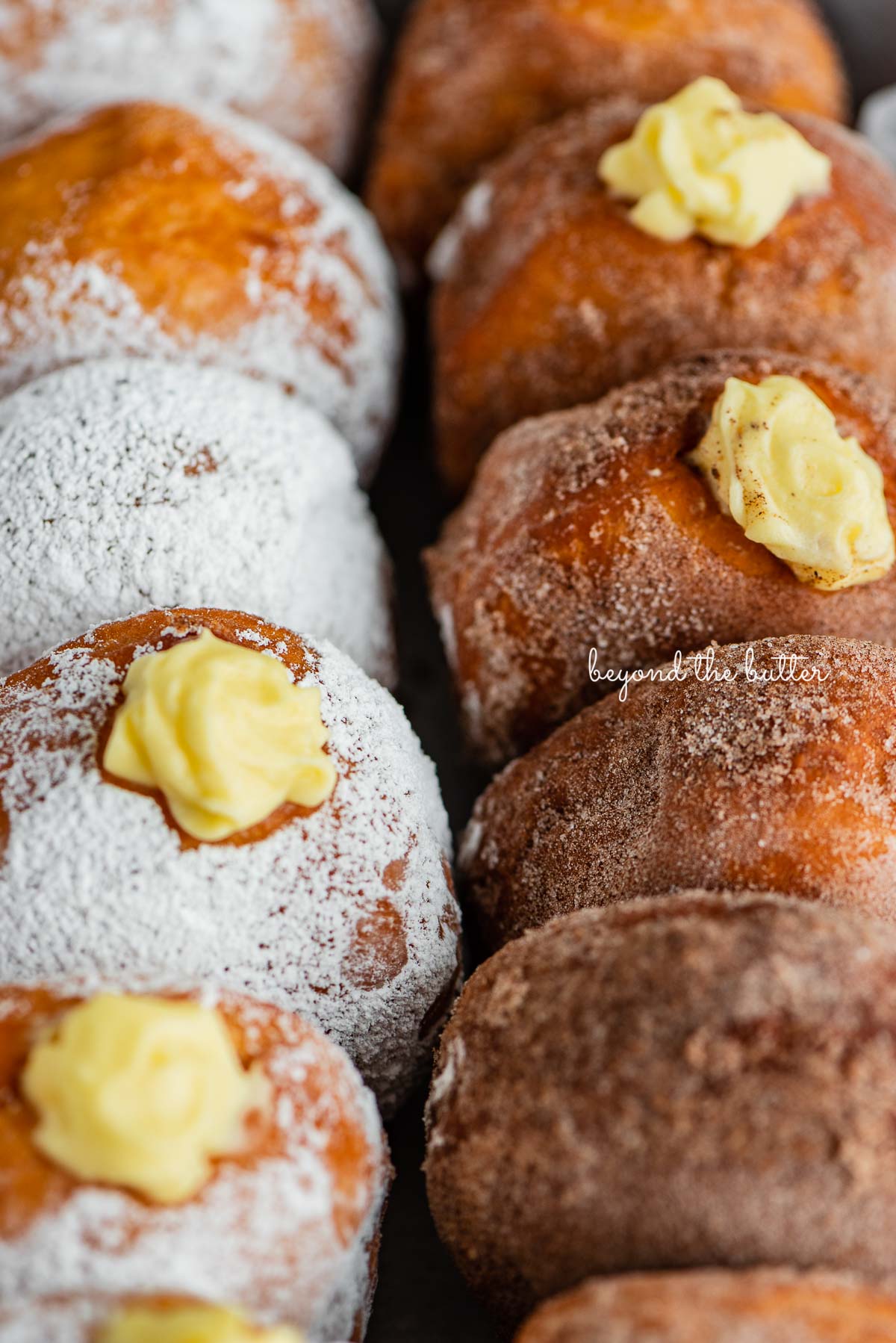 Homemade Pennsylvania dutch fasnacht doughnuts filled with pastry cream | © Beyond the Butter®
