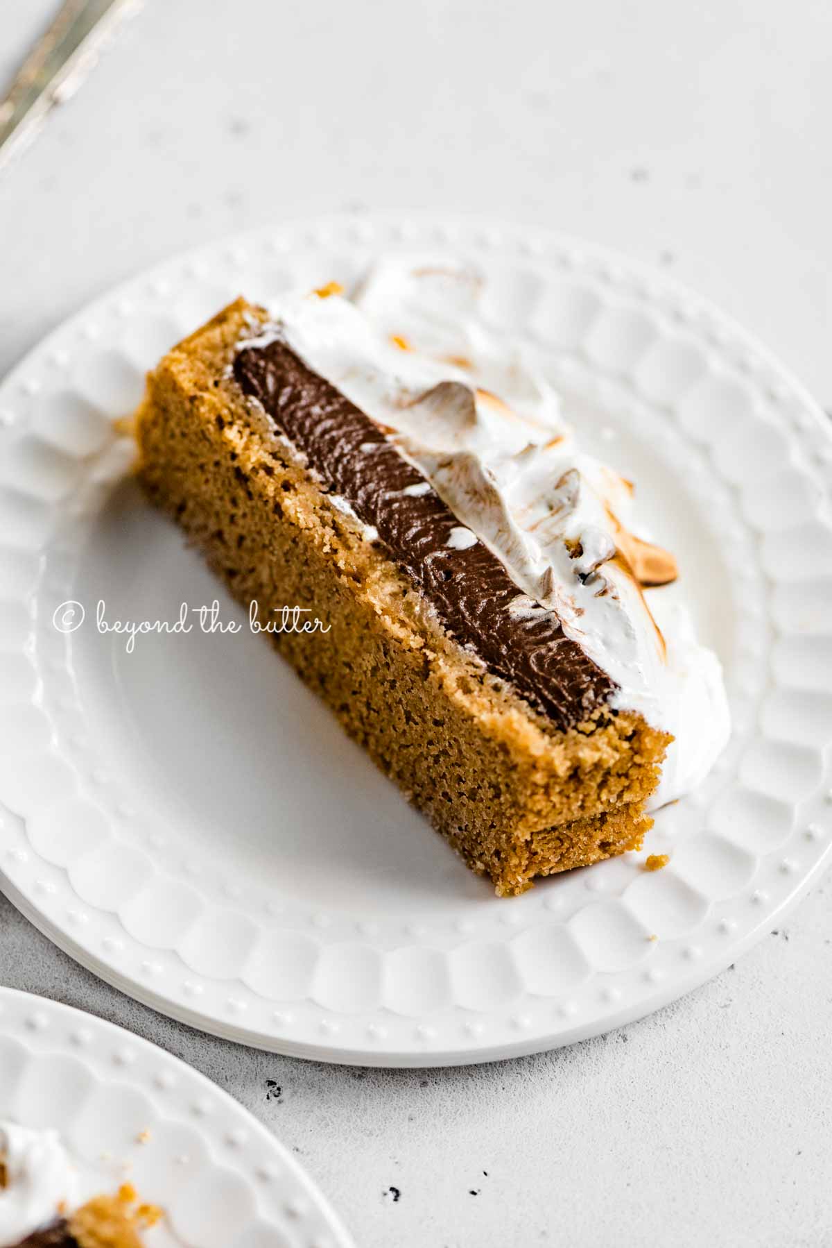 Images of one slice of chocolate marshmallow tart | All Images © Beyond the Butter™