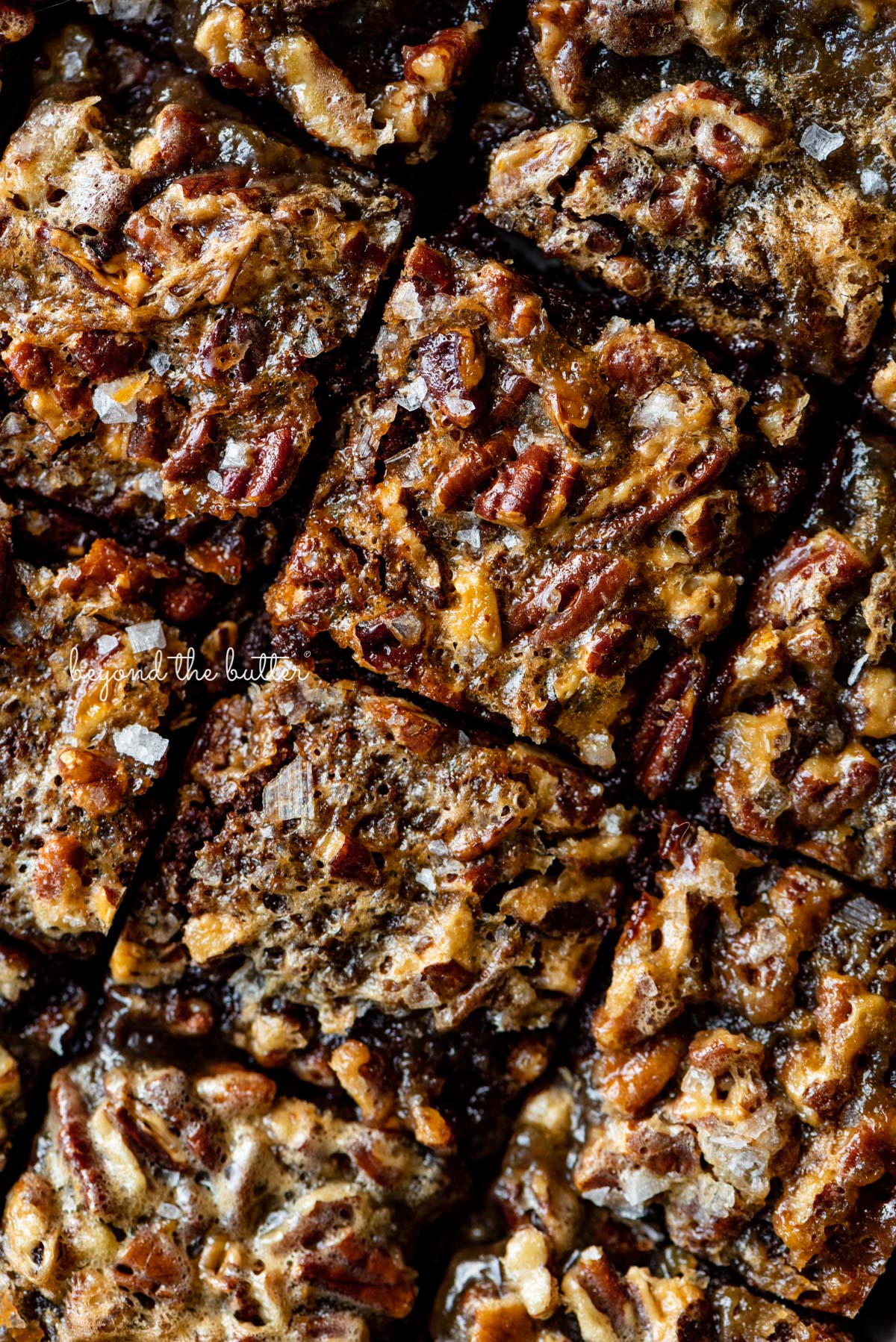 Just sliced salted pecan pie brownies from BeyondtheButter.com | © Beyond the Butter®