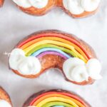 Overhead closeup image of homemade Rainbow Donuts.