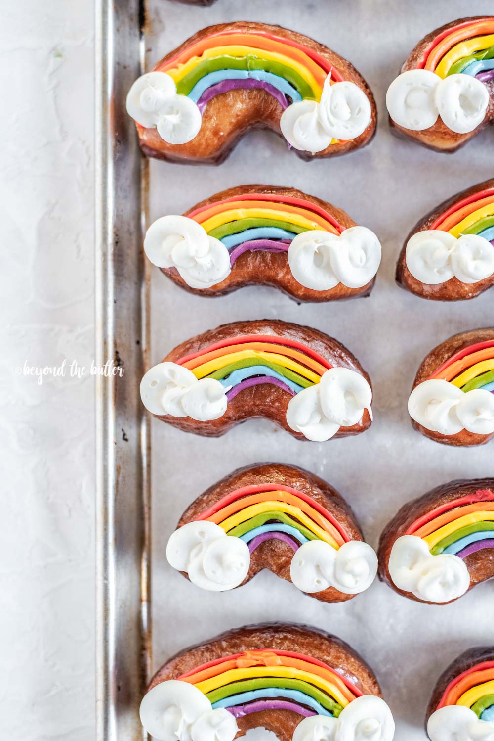 Overhead image of homemade Rainbow Donuts | All Images © Beyond the Butter, LLC