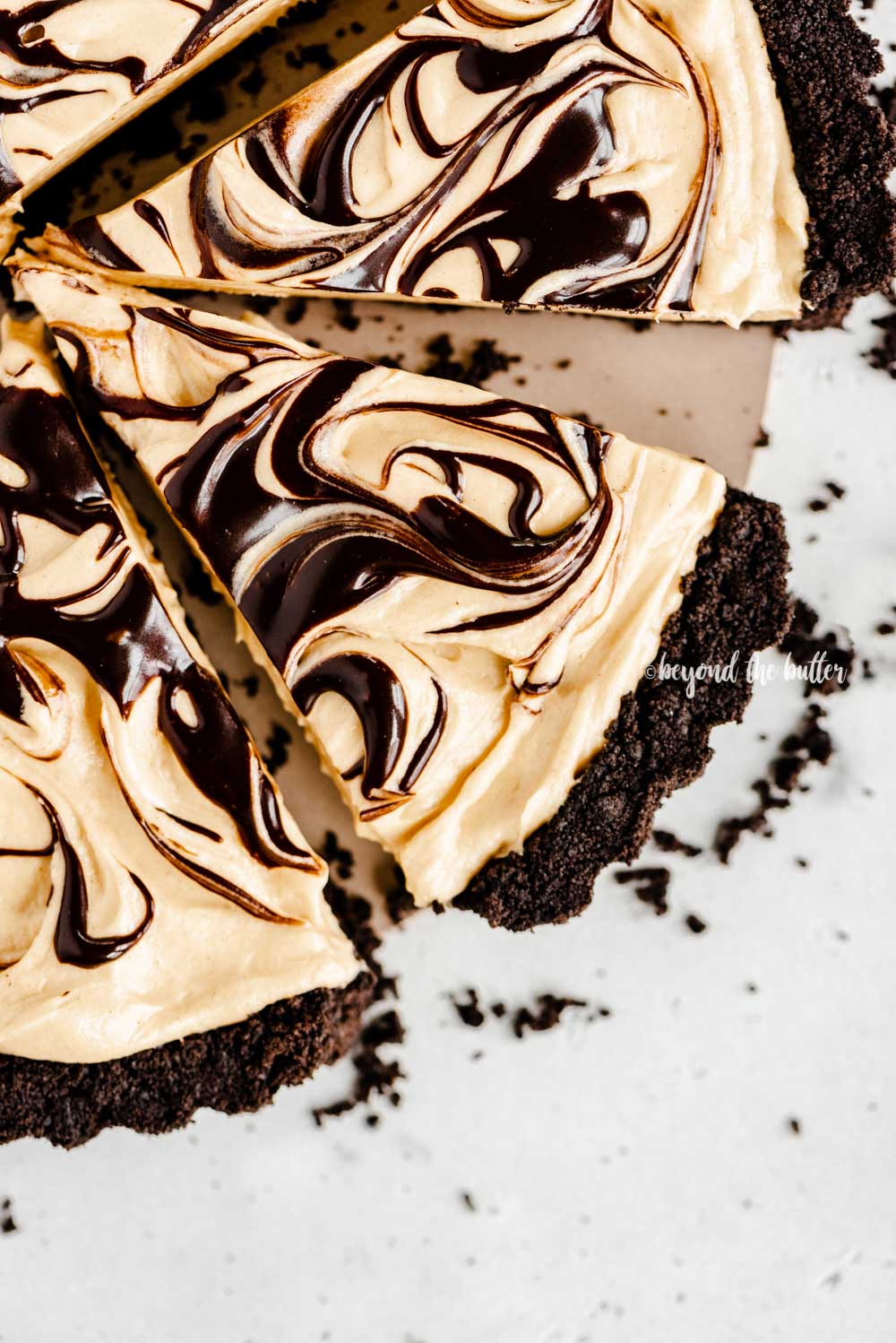 Overhead image of sliced chocolate peanut butter swirl tart | All Images © Beyond the Butter™