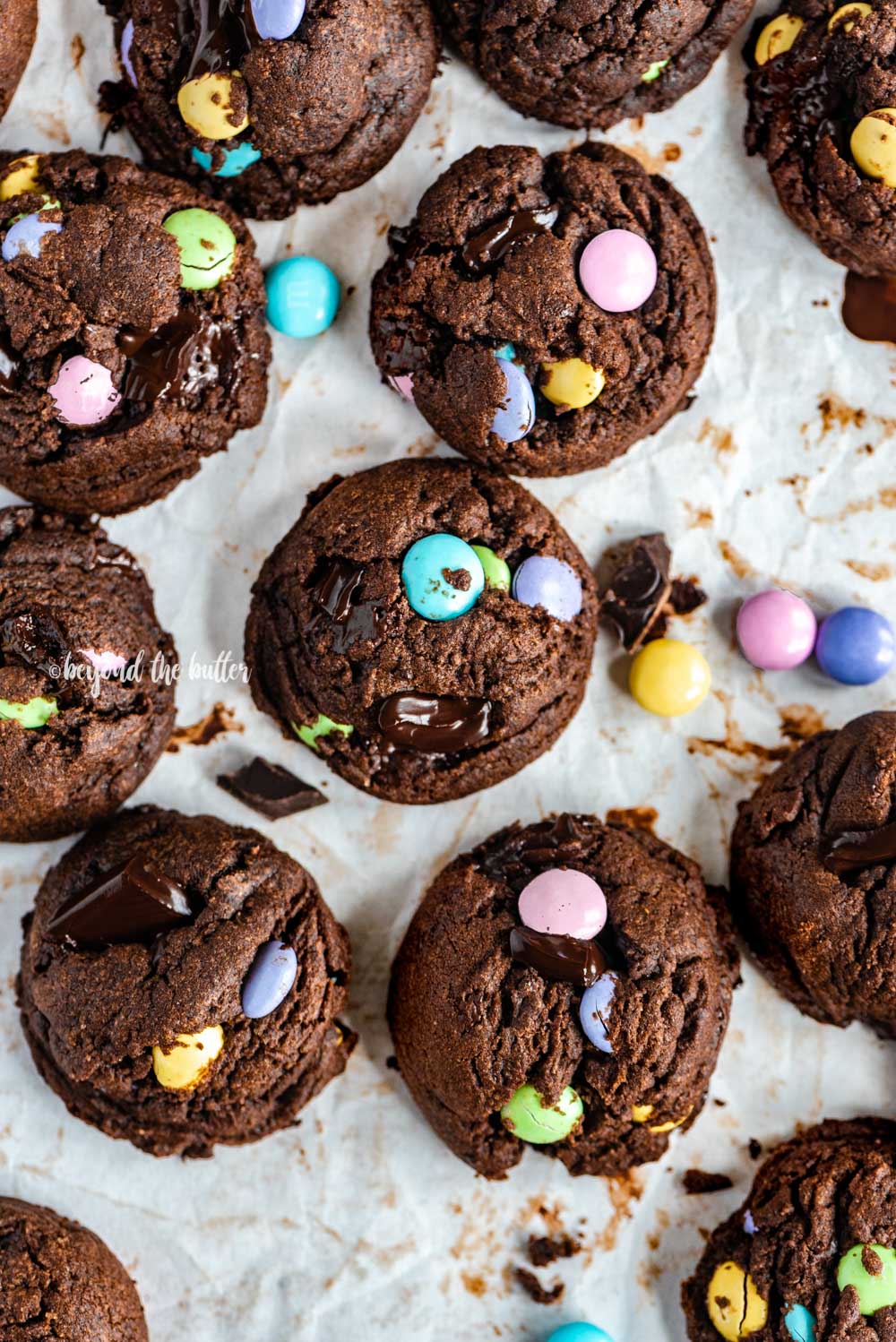 Overhead image of just baked double chocolate chunk m&m cookies | All Images © Beyond the Butter™