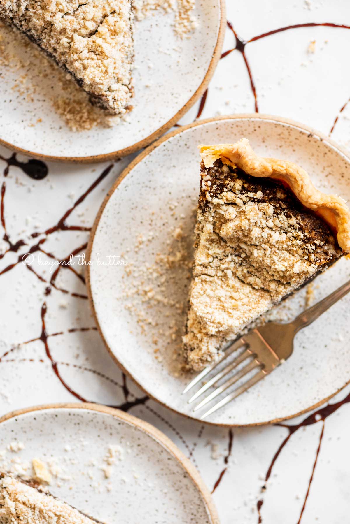 Slices of shoo fly pie on dessert plates | All Images © Beyond the Butter™