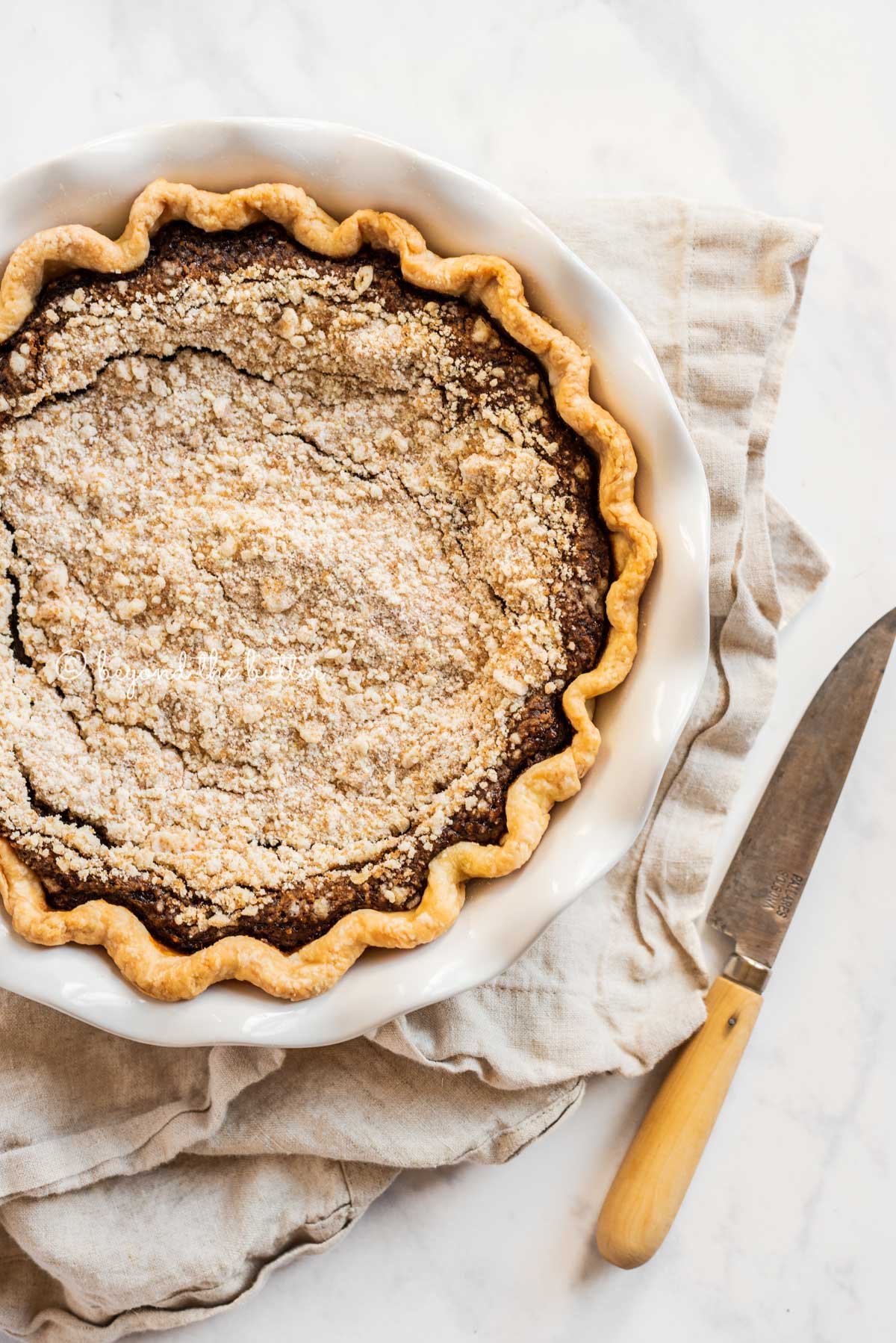 Off center overhead image of pennsylvania dutch shoo fly pie | All Images © Beyond the Butter™