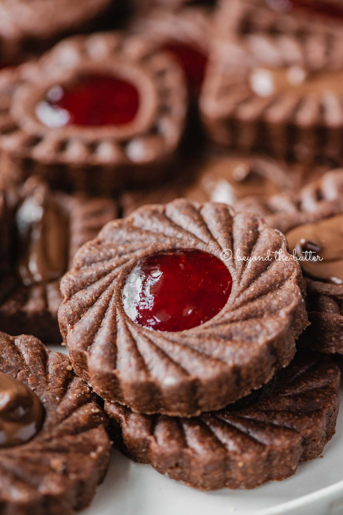 Closeup image of chocolate thumbprint cookies | All Images © Beyond the Butter®