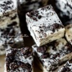 Randomly stacked pieces of cookies and cream fudge | All Images © Beyond the Butter®