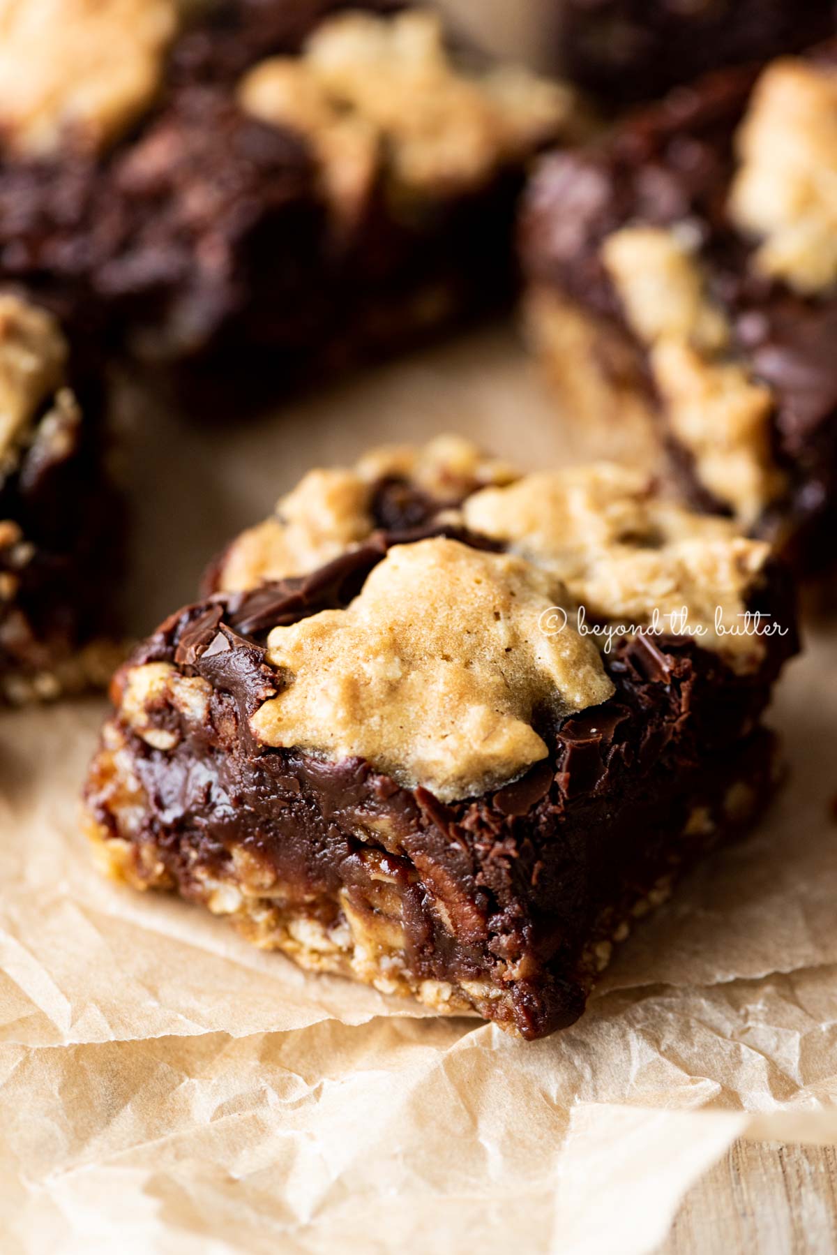 Classic fudge nut bars on parchment paper | All Images © Beyond the Butter®
