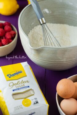 Whisking the dry ingredients to make lemon raspberry ricotta cake from Beyond the Butter | © Beyond the Butter®
