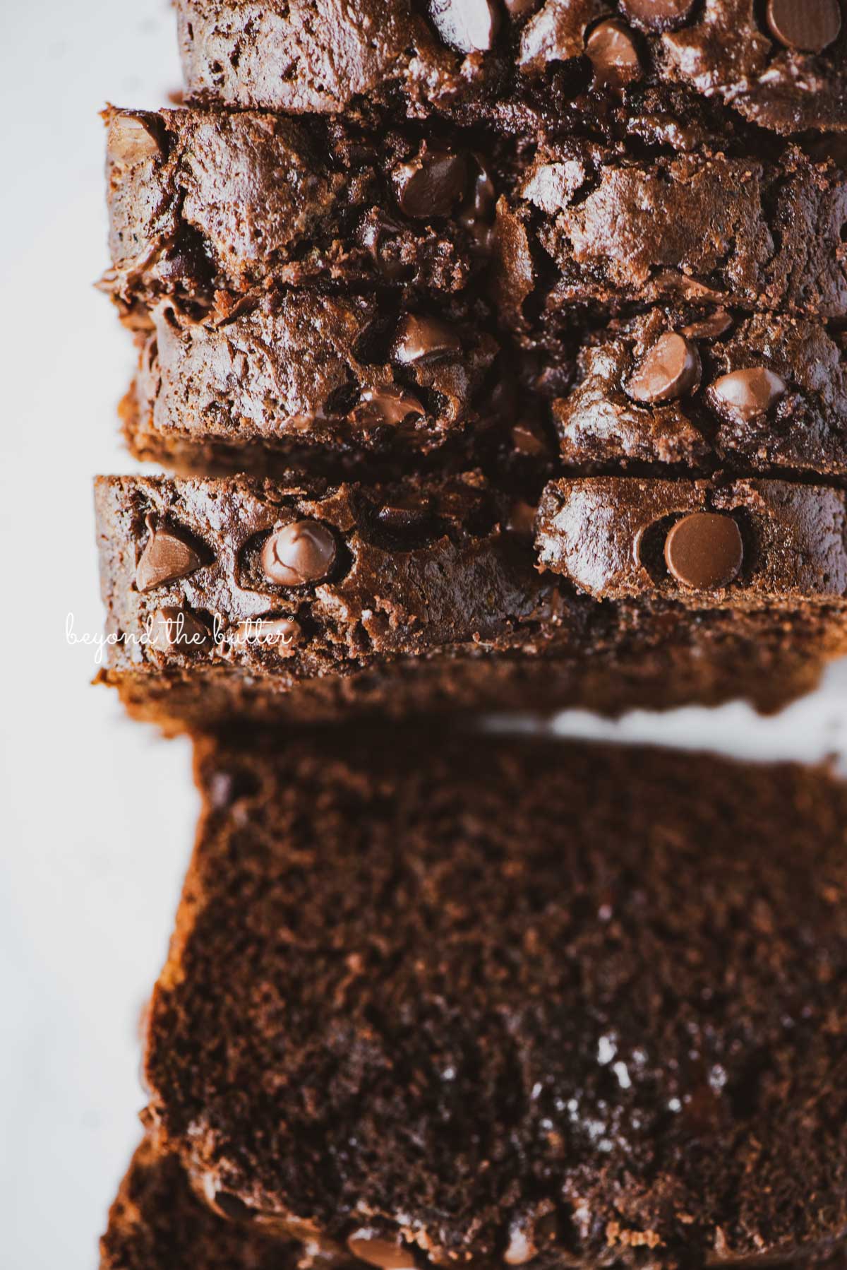 Sliced chocolate zucchini bread | © Beyond the Butter®
