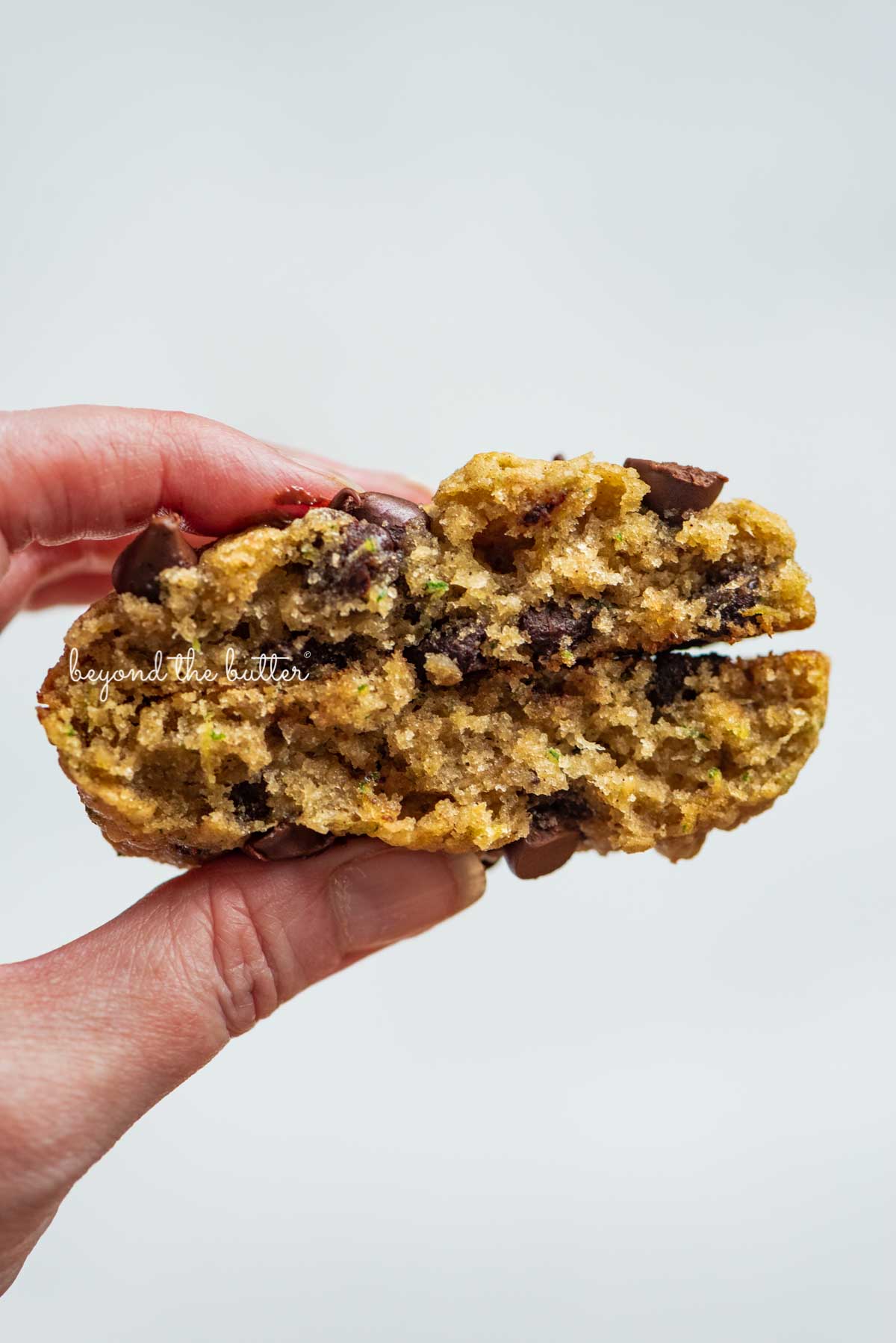 Inside shot of a zucchini chocolate chi oatmeal cookie from BeyondtheButter.com | © Beyond the Butter®