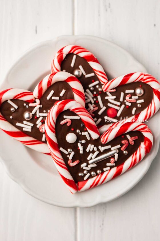 Close up of candy cane hearts on dessert plate | © Beyond the Butter®
