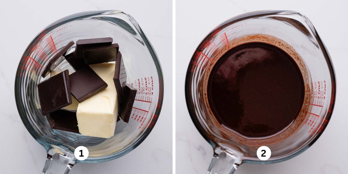Melting a stick of butter and dark chocolate squares together in a large glass measuring cup on a white marbled background.