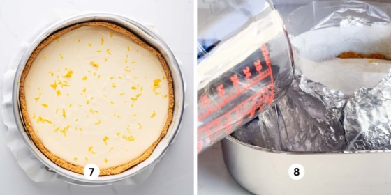 Pre-baked lemon cheesecake in a springform pan placed in a stainless steel roasting pan with boiling water being poured into the pan for the cheesecake water bath.